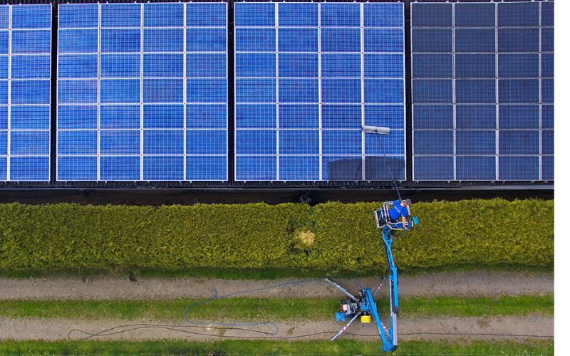 Roof mounted solar panels cleaning